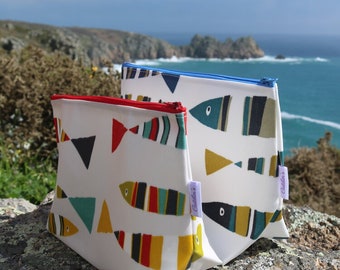 Stand alone oilcloth washbag fish design.