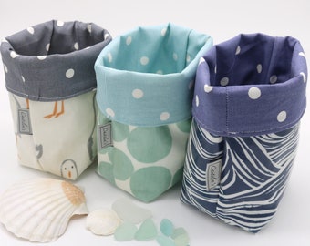 Cotton and oilcloth fabric buckets. Storage pots. Range of designs. Home organisation. Storage solution.