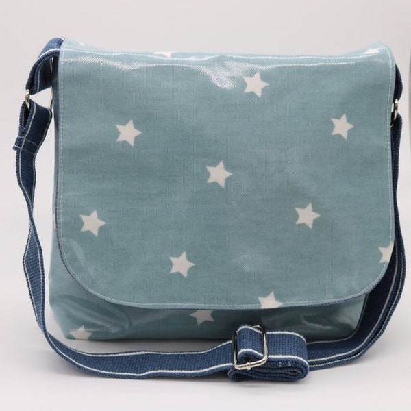 Blue star oilcloth messenger bag.