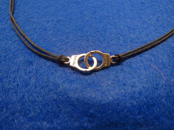 Sherlock unisex handcuffs cord anklet / bracelet / necklace | Etsy