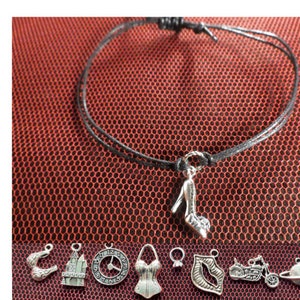 Rocky Horror Show unisex adjustable looped cord bracelet with the charm of your choice.