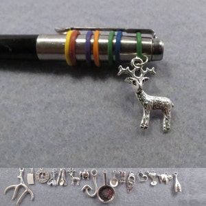 Hannibal pen charm of your choice.