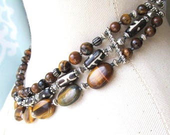 Natural stone multistrand necklace. Tiger eye and yak bone graduated necklace 16-18"