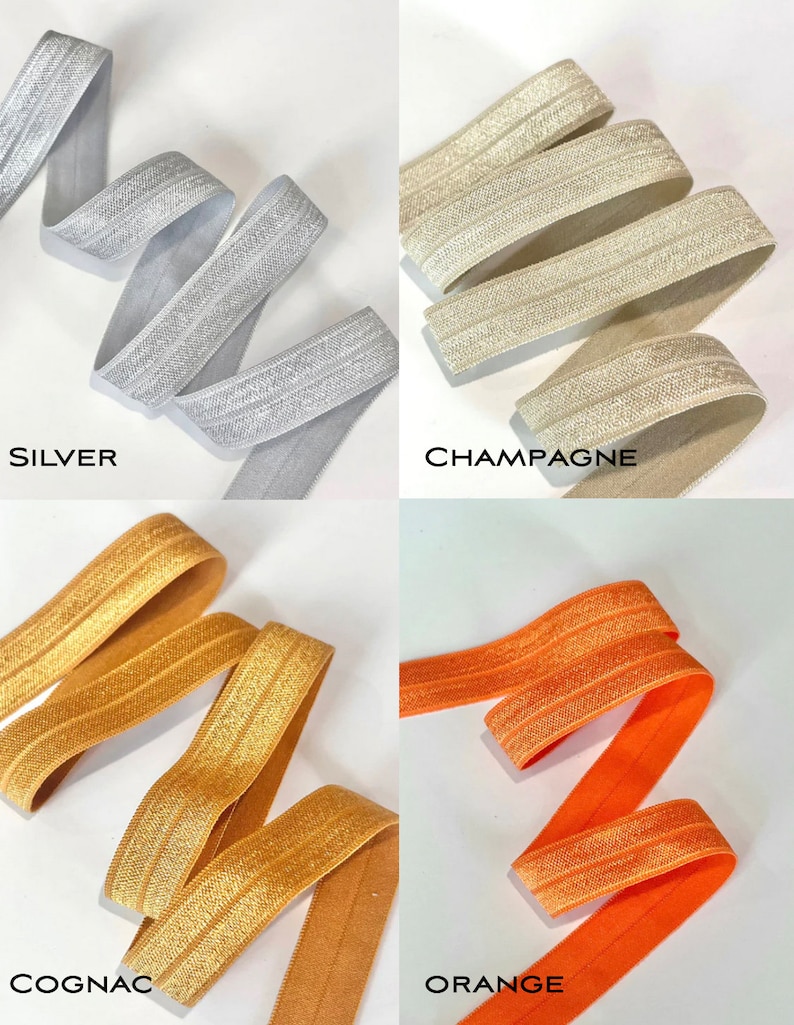 Puede incluir: Cuatro rollos de cinta el&aacute;stica con un acabado brillante. Los colores son plata, champ&aacute;n, co&ntilde;ac y naranja.