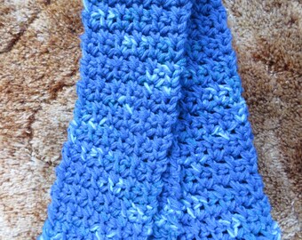 May include: A blue and light blue crocheted scarf with a textured pattern.