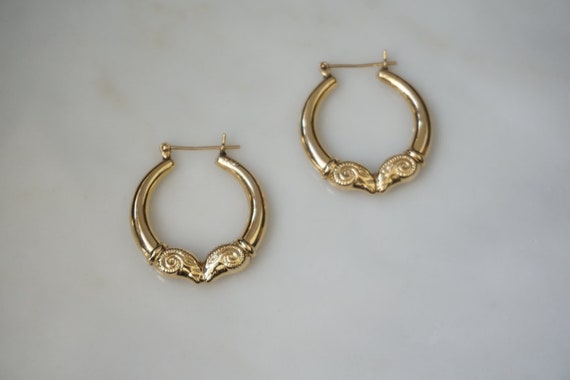 Gold ram head hoop on sale earrings