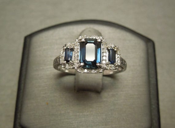 Past present future emerald sale cut diamond ring