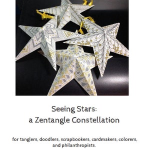 May include: Four white paper stars with gold and gray Zentangle designs. The stars are layered on top of each other and have yellow ribbon accents. The image text reads "Seeing Stars: a Zentangle Constellation for tanglers, doodlers, scrapbookers, cardmakers, colorers, and philanthropists. by Cris Letourneau, CZT www.TangledUpInArt.com"