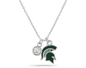 May include: A silver chain necklace with a green and silver Spartan helmet charm and a clear crystal charm.