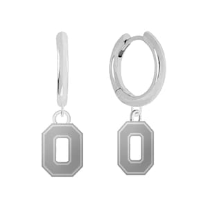 May include: Silver hoop earrings with a silver charm in the shape of the letter "O" with a gray outline.