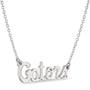 May include: Silver necklace with the word "Gators" spelled out in a cursive font.