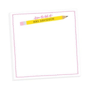 May include: White notepad with a pink scalloped border. The top of the notepad has a yellow pencil with a pink eraser and the text "from the desk of MRS. DAVIDSON".