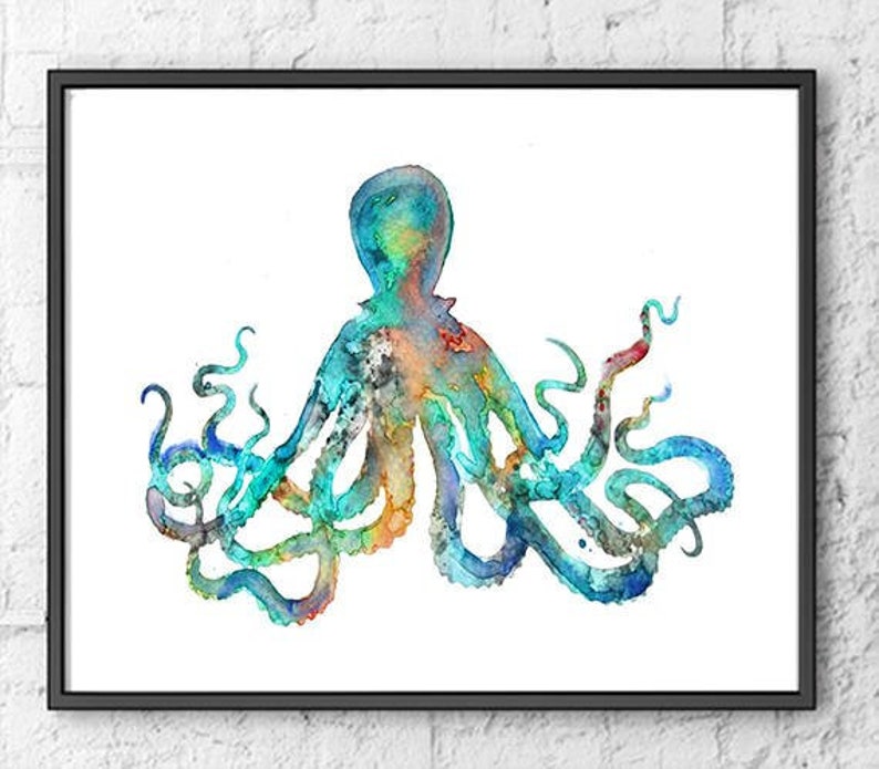 May include: Watercolor painting of an octopus in a black frame. The octopus is depicted in shades of blue, teal, orange, and red. The tentacles curl and twist against a white background. The artwork is framed and ready to hang.