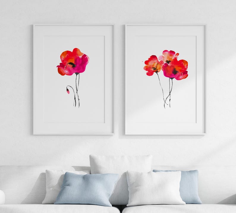 May include: Two framed watercolour paintings of red poppies. The painting on the left features a single poppy with a bud. The painting on the right features three poppies.