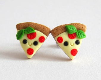 May include: A pair of cute pizza slice earrings with red pepperoni, green basil, and a smiling face. The earrings are made of polymer clay and are perfect for adding a touch of whimsy to any outfit.