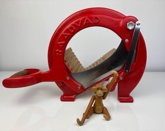 Zeldzame kleur. Raadvad Roodbroodsnijmachine. Deense broodsnijder. Vintage Scandinavisch modern uit het midden van de eeuw. Model 294. Jaren 60