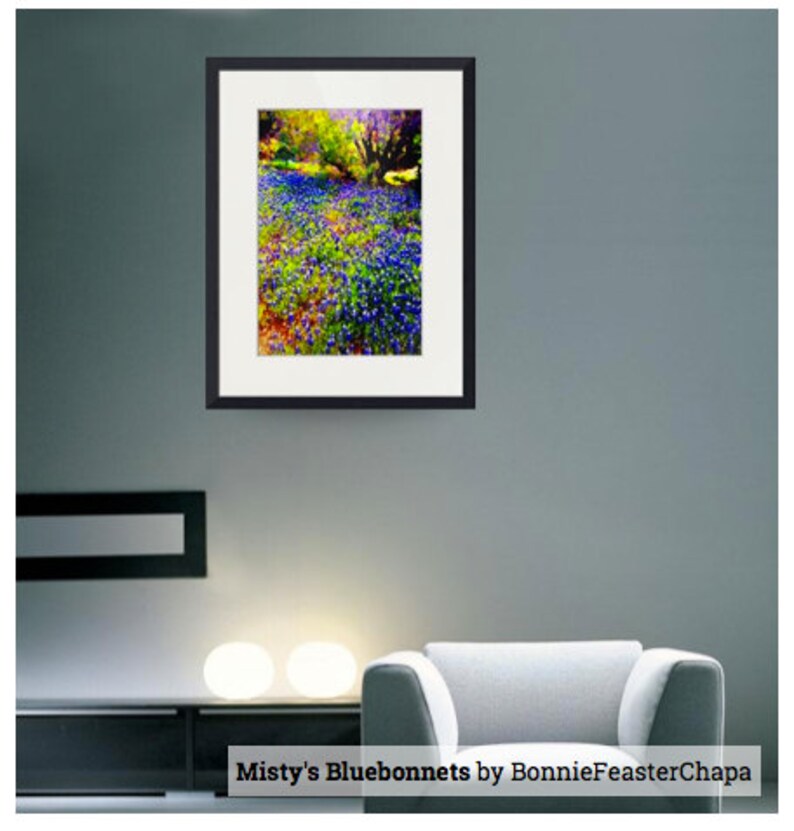 May include: A framed photograph of a field of bluebonnets in bloom. The flowers are a vibrant blue and purple, and the background is a soft green and yellow. The image is titled "Misty's Bluebonnets by BonnieFeasterChapa".