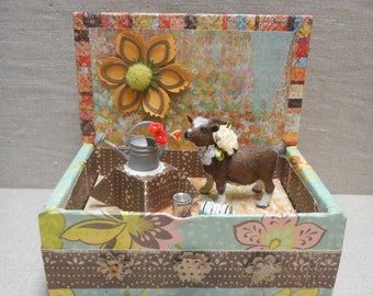 Miniature roombox - baby goat in the garbage