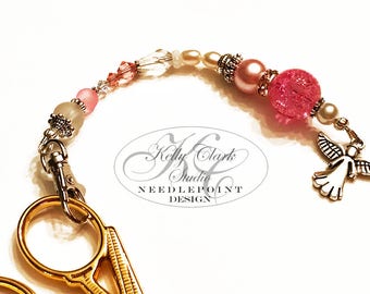 Porte-ciseaux ange rose doux