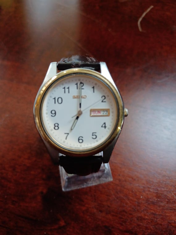 〇Nc左1045 昭和レトロ SEIKO QUARTZ DM303E オレンジ 〇Nc左1045 昭和レトロ SEIKO QUARTZ DM303E オレンジ 〇Nc左