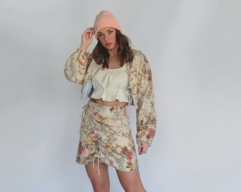 Reversible floral print and quilted blue satin jacket and skirt set