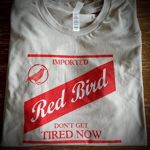 Red bird t shirt deals