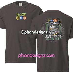 May include: A dark gray t-shirt with a green, white, and orange logo that says "Honk MSG" on the front. The back of the shirt has a graphic of a goose on a subway train with the text "MSG Madison Square Garden June 28th 2025 New York City".