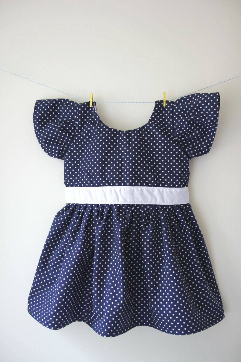 Girls navy dress with white spots / dots, spotty dress, dotty dress, girls wedding outfit, baby wedding outfit, toddler dress, baby dress image 1