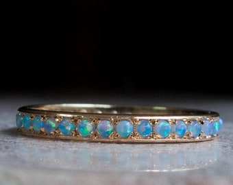 14 Karat Gold Opal Eternity Ring