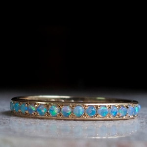 14 Karat Gold Opal Eternity Ring