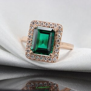 Emerald diamond halo ring image 3