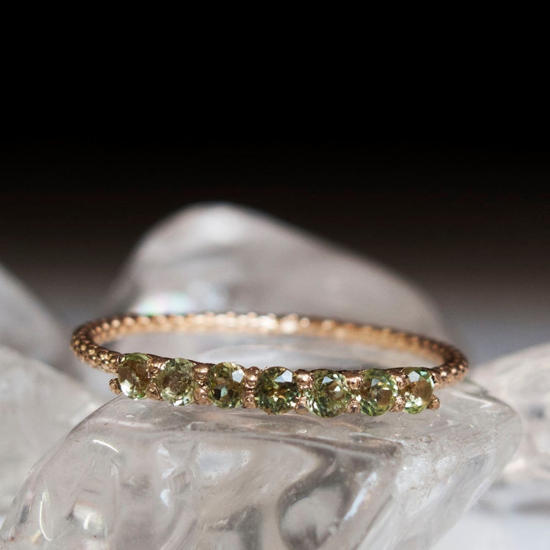 Half eternity ring Gold peridot ring 7 stone ring Gold Peridot ring Peridot ring Pale green stone image 1