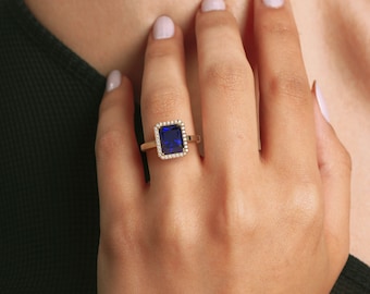 Gleaming Majesty: Handmade Emerald Cut Sapphire Gemstone Ring with Diamond Halo in 10K/14K Gold