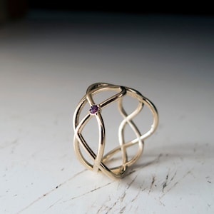 Gold Infinity Ring with Ruby