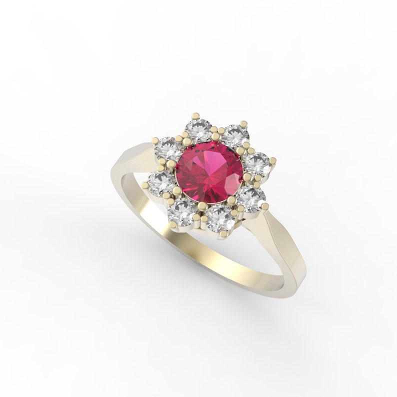 May include: A gold ring with a red gemstone surrounded by smaller white gemstones. The ring has a flower-like design.