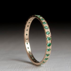 Gold Emerald Eternity ring