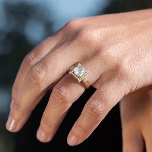 Cushion cut Moissanite and diamond ring