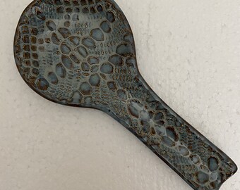 Handmade spoon rest textured using antique doily pattern with rustic blue glazing. 9" long x 4" wide. Free shipping!