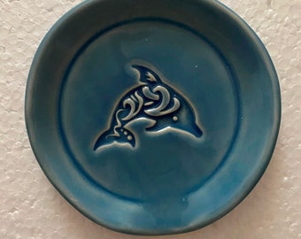 Dolphin spoon rest 4" round finished with sky blue glaze, Food and dishwasher safe, Environmentally friendly stoneware clay. Will ship free.