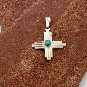 Sterling Silver Zia Sun pendant necklace with turquoise stones
