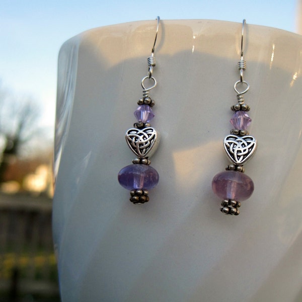 Sterling Silver Amethyst and Swarovski Crystal Earrings enhanced by a silver plated heart beads.  Handmade Earrings.  Amethyst Earrings