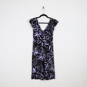 May include: A black and purple floral print dress with a v-neck and short ruffle sleeves.