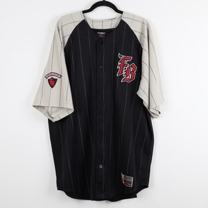 May include: A black and beige pinstriped baseball jersey with a button-down front. The chest features a red and white embroidered FB logo. A shield-shaped patch with the text FB Collection is on the right sleeve, and a rectangular label is at the hem.