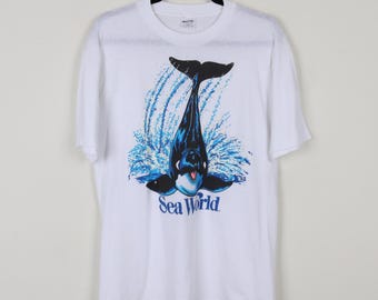 Vintage 90s White Sea World Dolphin White Graphic Print Tee Mammals Animal Single Stitch Ocean Animals Nautical Nature T-shirt Size Large