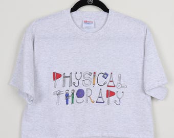 Camiseta corta con estampado gráfico gris de fisioterapeuta vintage de los años 90, con puntada simple, reinterpretada, para estudiantes de medicina, talla mediana