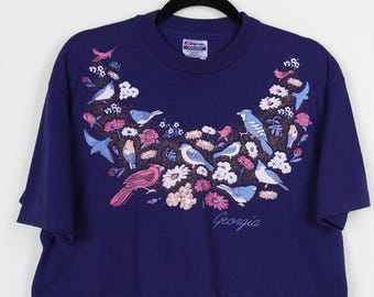 Camiseta corta con estampado gráfico de flores coloridas, pájaros y flores azules de Georgia vintage de los años 90, remera corta con costura simple y remendada, talla grande