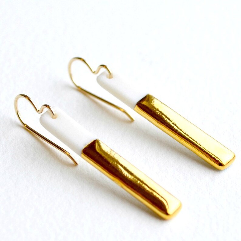 skinny gold-dipped porcelain bar earrings image 2