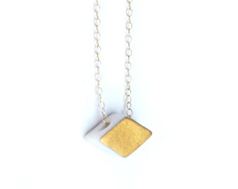 diamond shaped necklace, shiny or matte gold finish