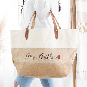 canvas jute burlap layered tote bag with faux leather handles, personalized teacher name, and glitter apple accent