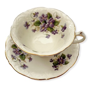 Hermoso juego de taza de té y platillo de porcelana Paragon Purple Violets